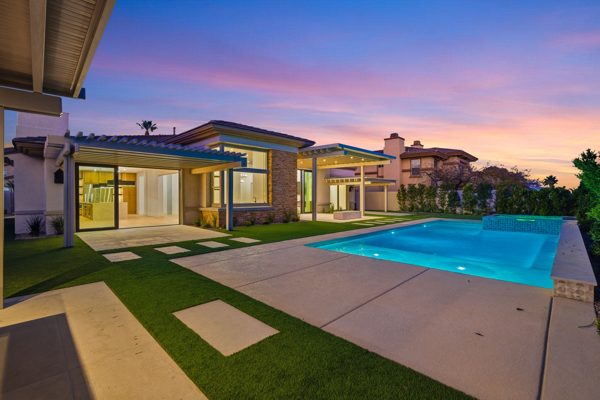 Modern Las Vegas home with pool at dusk